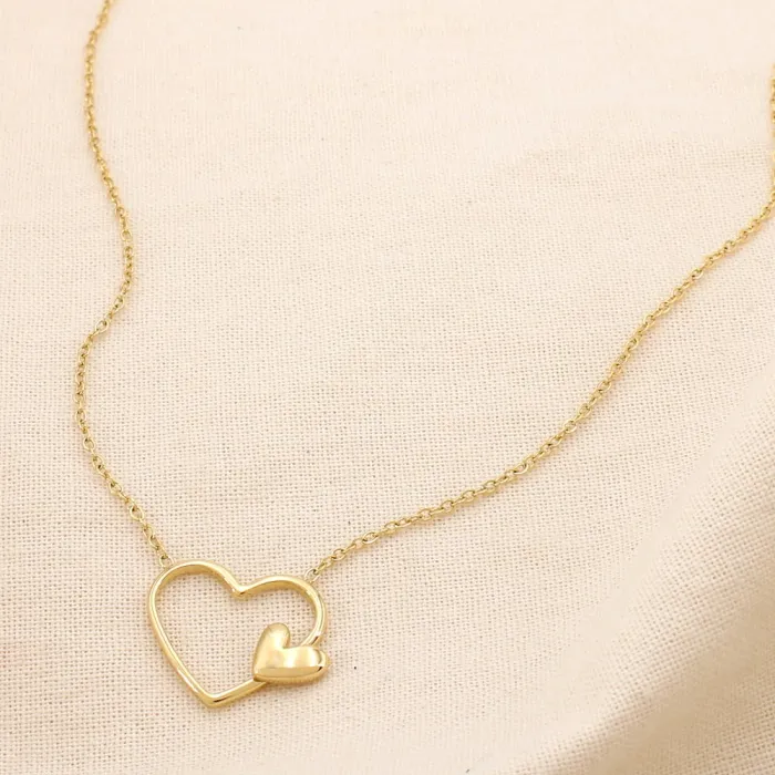 Collier en acier inoxydable avec double cœur doré