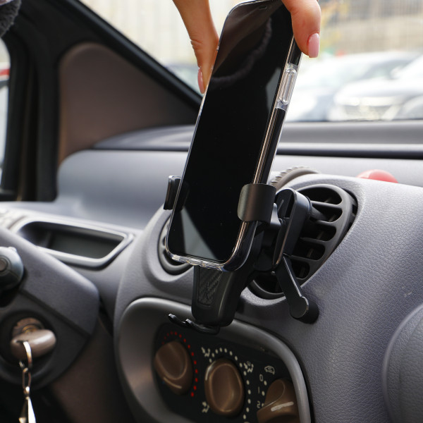 Support Téléphone Voiture à Gravité – Fixation Grille d'Aération – Image 4